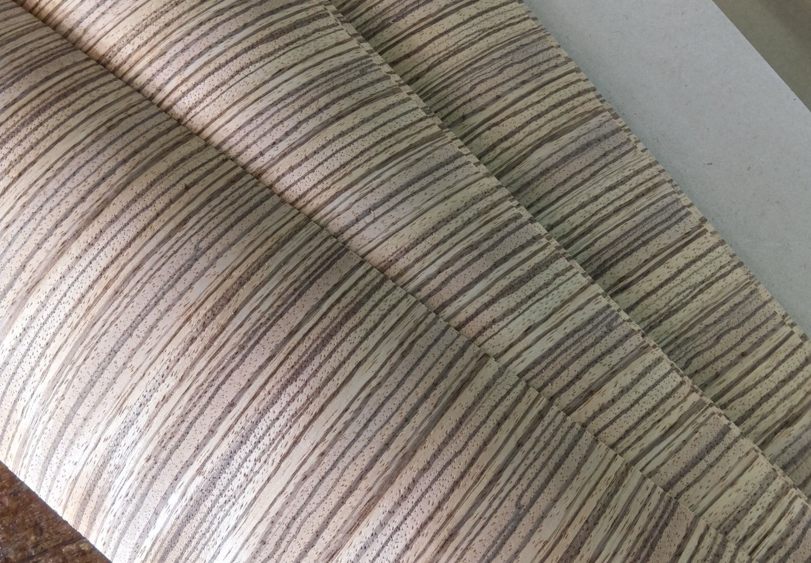 Applying natural wood veneer